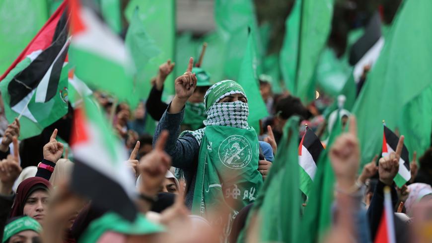 Palestinians take part in a rally marking the 31st anniversary of Hamas' founding, in Gaza City December 16, 2018. REUTERS/Ibraheem Abu Mustafa - RC1AF0B233A0