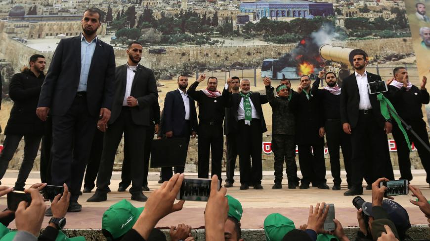 Hamas Chief Ismail Haniyeh gestures during a rally marking the 31st anniversary of Hamas' founding, in Gaza City December 16, 2018. REUTERS/Ibraheem Abu Mustafa - RC1262A82640