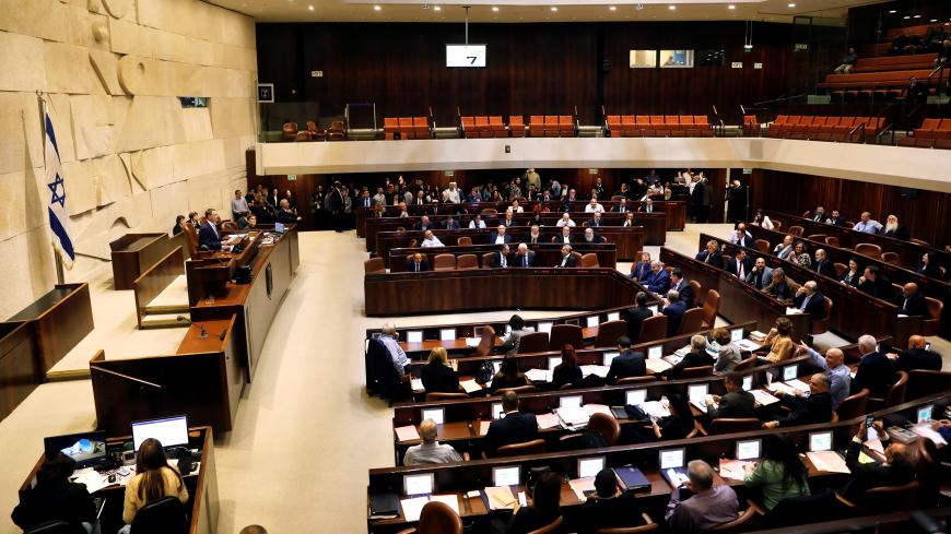 A general view shows the plenum at the knesset, Israel's parliament, in Jerusalem December 26, 2018. REUTERS/Ronen Zvulun - RC128845A660