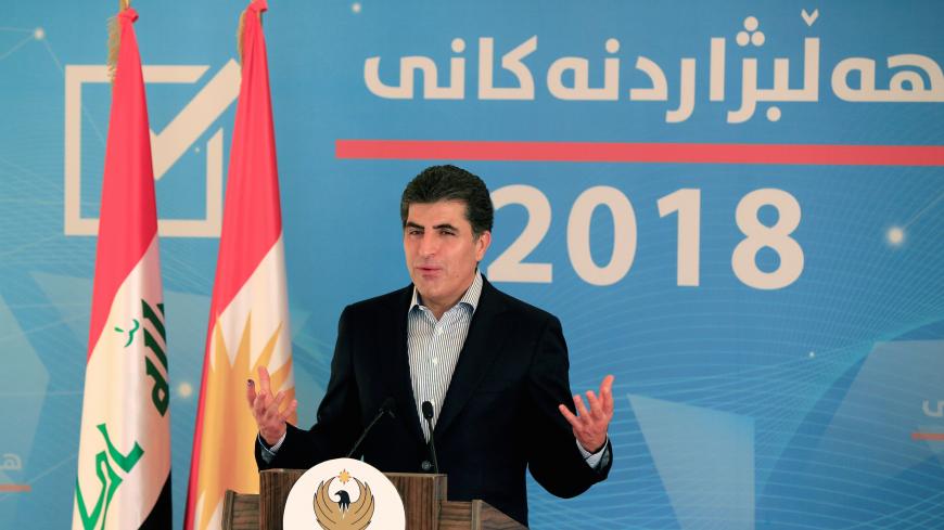 Kurdistan Regional Government Prime Minister Nechirvan Barzani speaks during a news conference after casting his vote, during parliamentary elections in the semi-autonomous region in Erbil, Iraq September 30, 2018. REUTERS/Thaier Al-Sudani - RC1904E48690