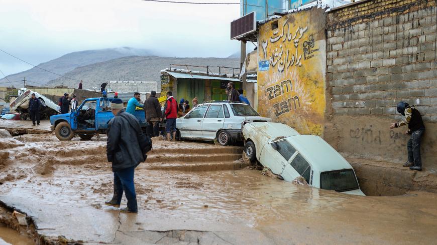 Damaged vehicles are seen after a flash flooding in Shiraz, Iran, March 26, 2019. Tasnim News Agency/via REUTERS ATTENTION EDITORS - THIS PICTURE WAS PROVIDED BY A THIRD PARTY - RC16EE5DB1C0