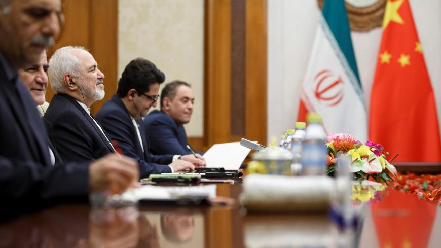 Iranian Foreign Minister Mohammad Javad Zarif (3rd L) meets Chinese Foreign Minister Wang Yi (not pictured) at Diaoyutai State Guesthouse in Beijing, China, May 17, 2019.  REUTERS/Thomas Peter/Pool - RC121FD92050