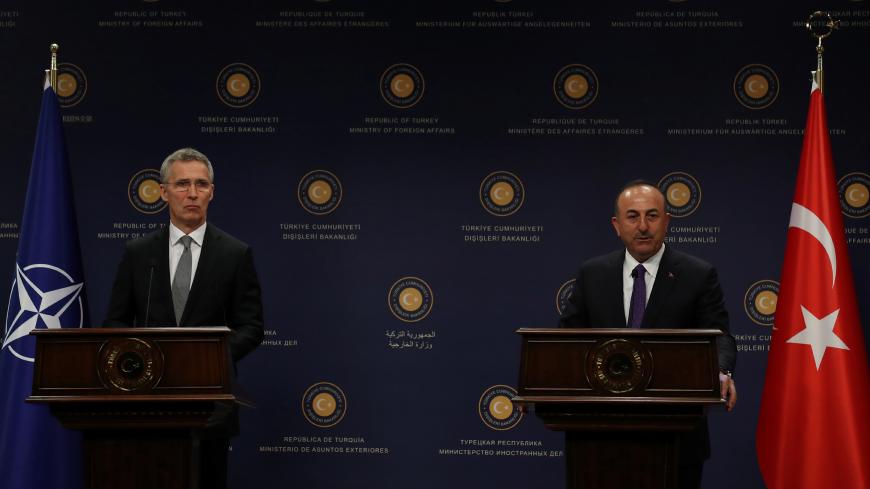 NATO Secretary-General Jens Stoltenberg and Turkish Foreign Minister Mevlut Cavusoglu attend a news conference in Ankara, Turkey April 16, 2018. REUTERS/Umit Bektas - RC1373DFDF70