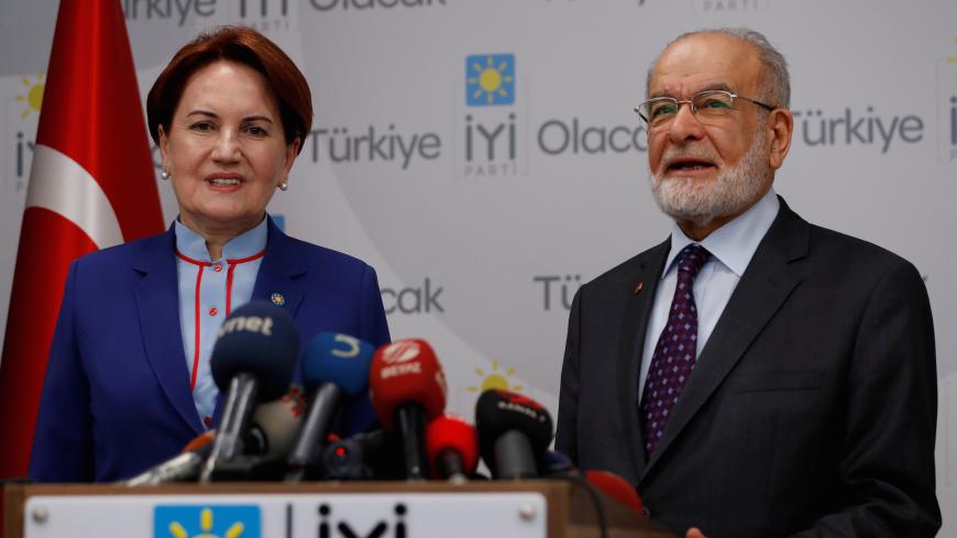 Saadet Party leader Karamollaoglu speaks after meeting with Iyi Party leader Aksener at Iyi Party headquaters in Ankara, Turkey April 24, 2018. REUTERS/Murad Sezer - RC11C9891450