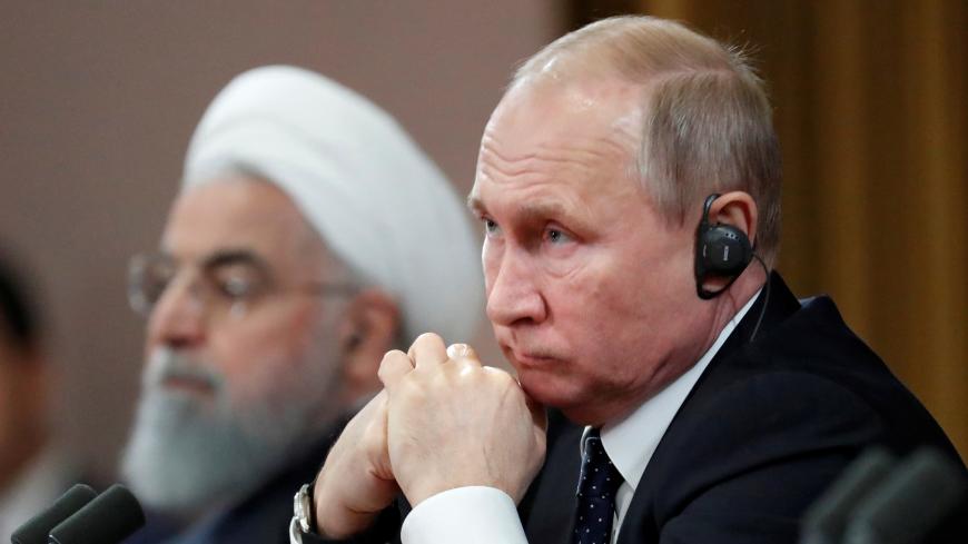 Russian President Vladimir Putin and Iranian President Hassan Rouhani attend a news conference, after a meeting in the Black sea resort of Sochi, Russia, 14 February 2019. Sergei Chirikov/Pool via REUTERS - RC158EB139B0