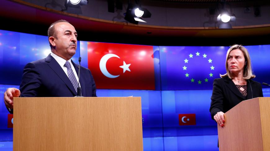 Turkish Foreign Minister Mevlut Cavusoglu and European Union foreign policy chief Federica Mogherini address a joint news conference atfer a Turkey-EU Association Council in Brussels, Belgium, March 15, 2019.  REUTERS/Francois Lenoir - RC1FD5E9ABC0