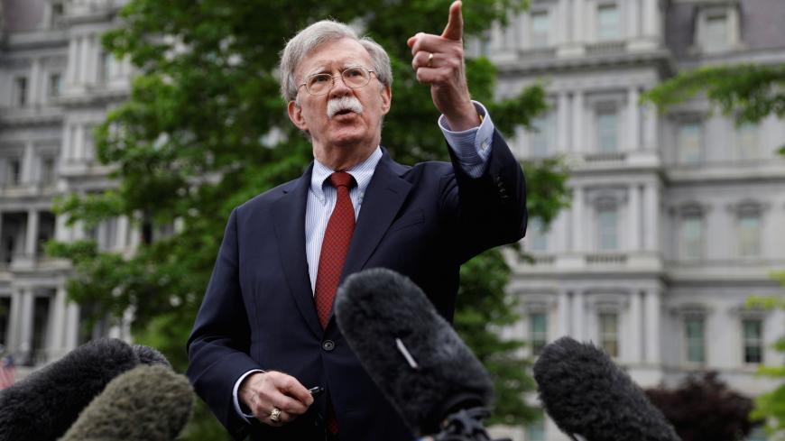 U.S. national security adviser John Bolton talks to reporters at the White House in Washington, U.S., May 1, 2019.  REUTERS/Kevin Lamarque - RC11226671B0