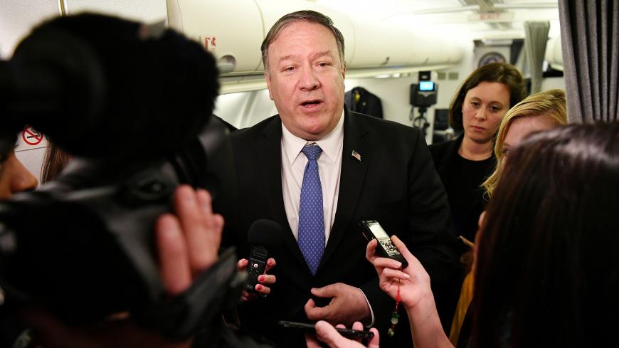 U.S. Secretary of State Mike Pompeo speaks to reporters in flight after a previously unannounced trip to Baghdad, Iraq, May 8, 2019. Mandel Ngan/Pool via REUTERS - RC1CBE5511B0