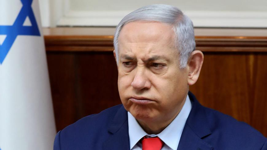 Israeli Prime Minister Benjamin Netanyahu reacts at the start of the weekly cabinet meeting at his Jerusalem office May 12, 2019.  Gali Tibbon/Pool via REUTERS - RC1CF7A3A580