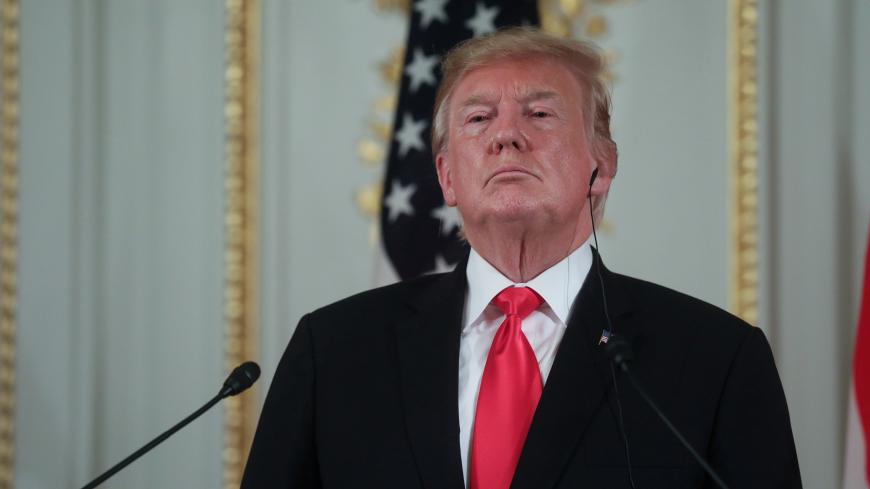 U.S. President Donald Trump listens during a news conference with Japan's Prime Minister Shinzo Abe at Akasaka Palace state guest house in Tokyo, Japan, May 27, 2019. REUTERS/Jonathan Ernst - RC1B9AAE6980