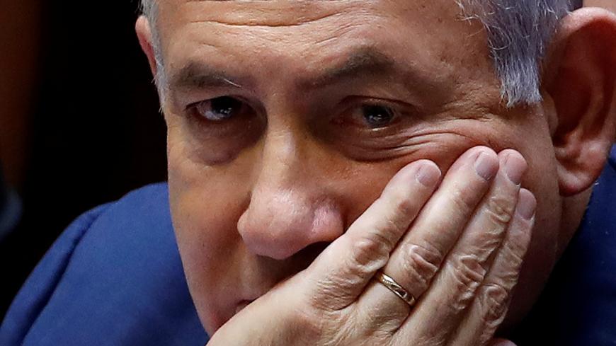 Israeli Prime Minister Benjamin Netanyahu sits at the plenum at the Knesset, Israel's parliament, in Jerusalem May 30, 2019. REUTERS/Ronen Zvulun - RC18F79442A0