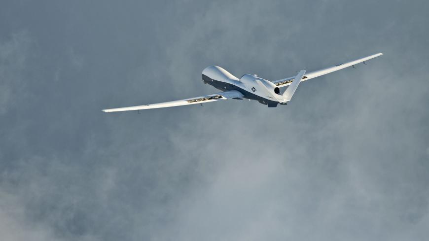The MQ-4C Triton unmanned aircraft system completes its inaugural cross-country ferry flight at Naval Air Station Patuxent River, Maryland in this U.S. Navy photo taken September 18, 2014. The Pentagon's review of intelligence and surveillance programs should be completed by mid-October, which will help clarify the future of the Navy's proposed carrier-based unmanned spy plane, a senior Navy official said on Tuesday. REUTERS/U.S. Navy/Erik Hildebrandt/Handout  (UNITED STATES - Tags: MILITARY) THIS IMAGE HAS