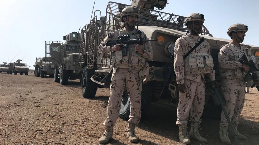 Members of the UAE armed forces secure an area while searching for landmines in Al-Mokha, Yemen March 6, 2018. Picture taken March 6, 2018. Reuters/ Aziz El Yaakoubi - RC1C9EFFB000
