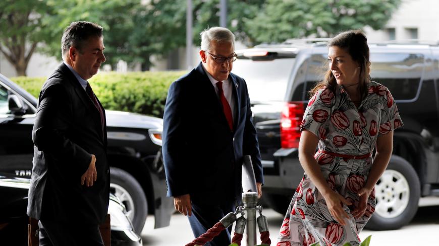 Turkish Deputy Foreign Minister Sedat Onal (L) and ambassador to the U.S. Serdar Kilic arrive at State Department in Washington, U.S., August 8, 2018. REUTERS/Yuri Gripas - RC1BB2E918C0