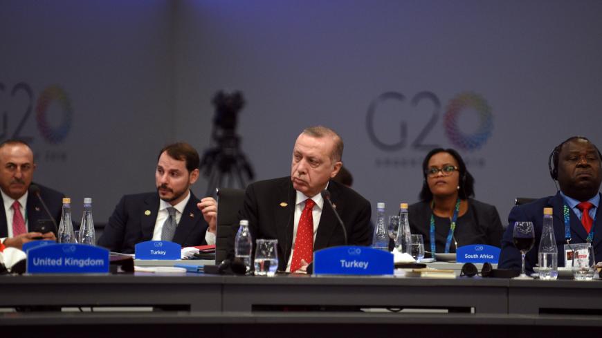 Turkish President Recep Tayyip Erdogan attends the plenary session at the G20 leaders summit in Buenos Aires, Argentina  December 1, 2018.  G20 Argentina/Handout via REUTERS ATTENTION EDITORS - THIS IMAGE WAS PROVIDED BY A THIRD PARTY. - RC1B008D34E0