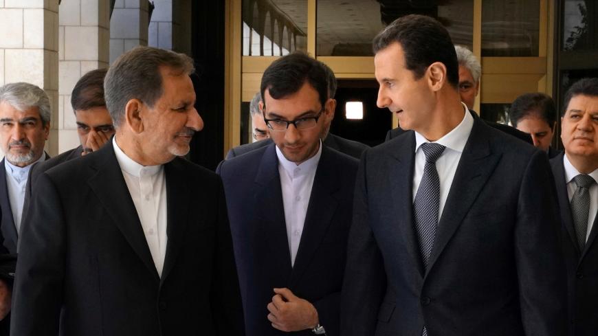 Iranian Vice President Eshaq Jahangiri meets with Syria's President Bashar al-Assad in Damascus, Syria in this handout released by SANA on January 29, 2019. SANA/Handout via REUTERS ATTENTION EDITORS - THIS IMAGE WAS PROVIDED BY A THIRD PARTY. REUTERS IS UNABLE TO INDEPENDENTLY VERIFY THIS IMAGE - RC1FA4E62B00