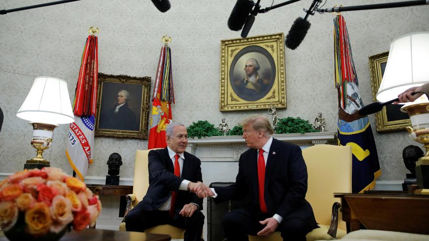 U.S. President Donald Trump meets with Israel's Prime Minister Benjamin Netanyahu in the Oval Office at the White House in Washington, U.S., March 25, 2019. REUTERS/Carlos Barria - RC1B90697DE0