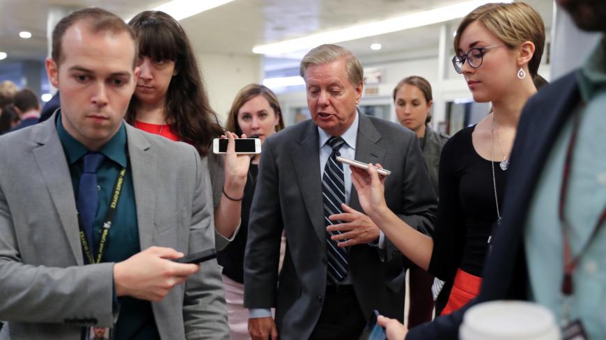 U.S. Senator Lindsey Graham (R-SC) speaks to reporters on his way to the Senate floor for a vote at the U.S. Capitol in Washington, U.S. May 14, 2019.  REUTERS/Jonathan Ernst - RC1F178C0200