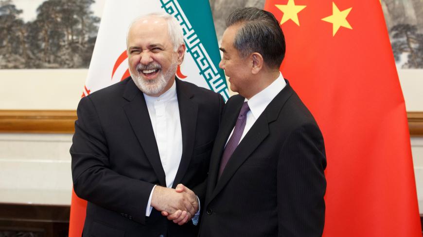 Chinese Foreign Minister Wang Yi meets Iranian Foreign Minister Mohammad Javad Zarif at Diaoyutai State Guesthouse in Beijing, China, May 17, 2019.  REUTERS/Thomas Peter/Pool - RC1B7A332720