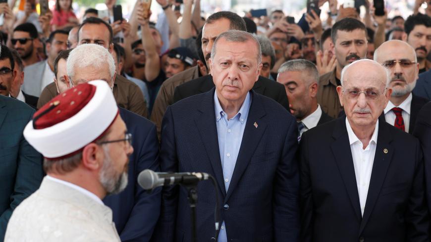 Turkish President Tayyip Erdogan attends a symbolic funeral prayer for the former Egyptian president Mohamed Mursi at the courtyard of Fatih Mosque in Istanbul, Turkey, June 18, 2019. REUTERS/Murad Sezer - RC12D77EC4C0