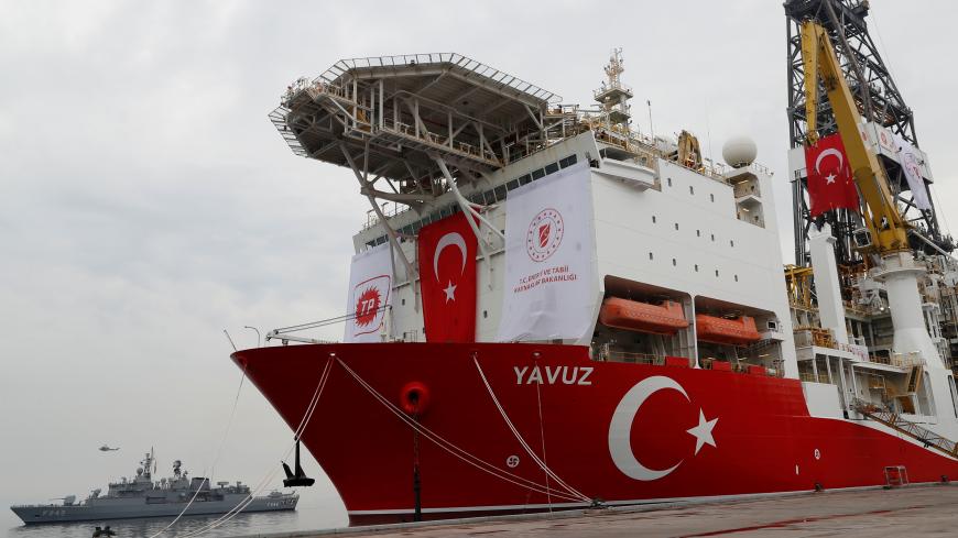 Turkish Navy frigate TCG Fatih (F-242) is seen next to Turkish drilling vessel Yavuz at Dilovasi port in the western city of Kocaeli, Turkey, June 20, 2019. REUTERS/Murad Sezer - RC1DB3BC89F0