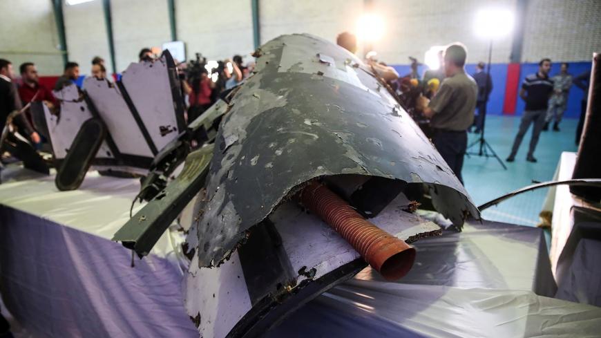 The purported wreckage of the American drone is seen displayed by the Islamic Revolution Guards Corps (IRGC) in Tehran, Iran June 21, 2019. Tasnim News Agency/Handout via REUTERS ATTENTION EDITORS - THIS IMAGE WAS PROVIDED BY A THIRD PARTY. - RC1FEE5FE760