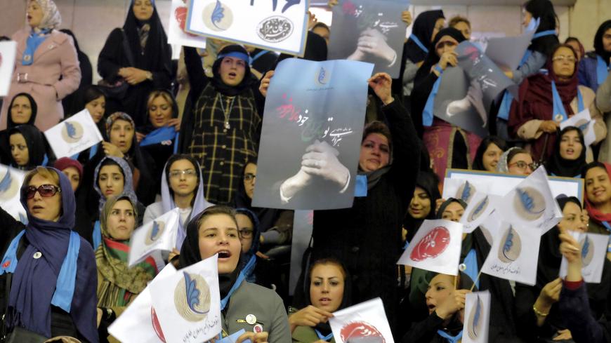 Iranian women holding electoral leaflets attend a reformist campaign for upcoming parliamentary election, in Tehran February 18, 2016. REUTERS/Raheb Homavandi/TIMA  ATTENTION EDITORS - THIS IMAGE WAS PROVIDED BY A THIRD PARTY. FOR EDITORIAL USE ONLY.  - GF10000314042