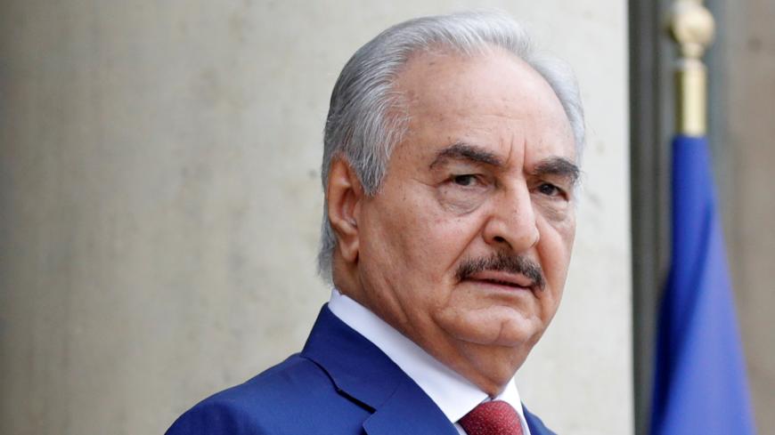 Khalifa Haftar, the military commander who dominates eastern Libya, arrives to attend an international conference on Libya at the Elysee Palace in Paris, France, May 29, 2018.  REUTERS/Philippe Wojazer - RC13D2341900