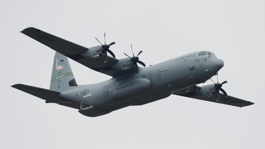A U.S. Air Force C-130 transport plane fly during the Clear Sky 2018 multinational military drills at Starokostiantyniv Air Base in Khmelnytskyi Region, Ukraine October 12, 2018. REUTERS/Gleb Garanich - RC1E8FF15980