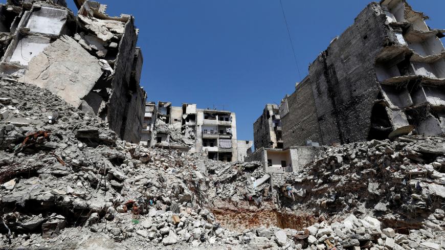A general view of Hassan Ahmed al-Aoul's house between rubble and damaged buildings in Aleppo's Salaheddine district, Syria April 13, 2019. Picture taken April 13, 2019. REUTERS/Omar Sanadiki - RC19CA5CE4B0