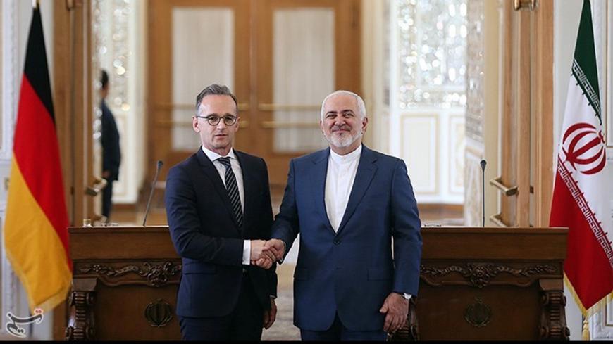 Iranian Foreign Minister Mohammad Javad Zarif shakes hands with his German counterpart Heiko Maas after the news conference in Teheran, Iran, June 10, 2019. Tasnim News Agency/Handout via REUTERS ATTENTION EDITORS - THIS IMAGE WAS PROVIDED BY A THIRD PARTY. BEST QUALITY AVAILABLE. - RC14EE2BCBC0