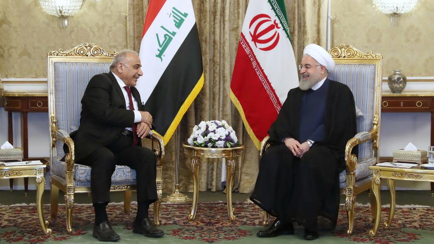 TEHRAN, IRAN - JULY 22: (----EDITORIAL USE ONLY  MANDATORY CREDIT - "IRANIAN PRESIDENCY / HANDOUT" - NO MARKETING NO ADVERTISING CAMPAIGNS - DISTRIBUTED AS A SERVICE TO CLIENTS----) Iraqi Prime Minister Adil Abdul-Mahdi (L) meets with Iranian President Hassan Rouhani (R) as part of his visit in Tehran, Iran on July 22, 2019. (Photo by Iranian Presidency / Handout/Anadolu Agency via Getty Images)