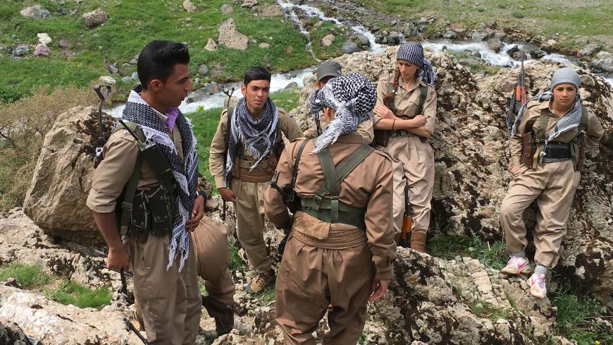 The Democratic Party of Iranian Kurdistan's (PDKI) armed wing, known as the Iranian peshmerga, located in the border near Iran continue their armed struggle against the Iranian government. They consider themselves Socialist Democrats The group practices daily training in the mountains and a nearby trading facility. The PDKi are an armed group who are trying to attain national rights within Iran. As of today Kurds who live in Iran continue under the Iranian government to have the freedom and rights that othe