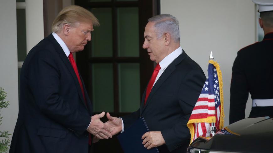 U.S. President Donald Trump and Israel's Prime Minister Benjamin Netanyahu shake hands as Netanyahu departs the White House from the West Wing in Washington, U.S. March 25, 2019. REUTERS/Leah Millis - RC12B9AA4CE0