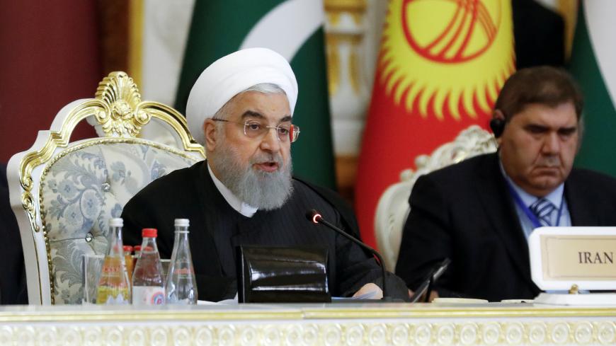Iranian President Hassan Rouhani delivers a speech at the Conference on Interaction and Confidence-Building Measures in Asia (CICA) in Dushanbe, Tajikistan June 15, 2019. REUTERS/Mukhtar Kholdorbekov - RC18D8234850
