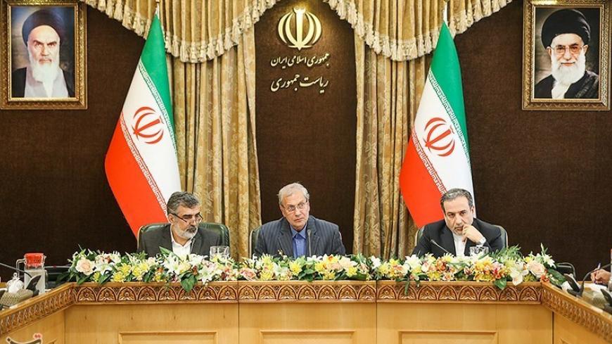 Abbas Araqchi, Iranian deputy foreign minister for political affairs (R), Behrouz Kamalvandi, Iran's Atomic Energy Organization spokesman (L) and Iran's government spokesman Ali Rabiei attend a news conferenece in Tehran, Iran July 7, 2019.  Tasnim News Agency/Handout via REUTERS. THIS IMAGE HAS BEEN SUPPLIED BY A THIRD PARTY. - RC188882BBC0