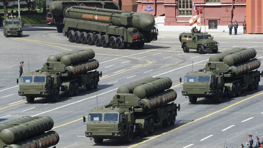 Russian S-400 Triumph/SA-21 Growler medium-range and long-range surface-to-air missile systems drive during the Victory Day parade at Red Square in Moscow, Russia, May 9, 2015. Russia marks the 70th anniversary of the end of World War Two in Europe on Saturday with a military parade, showcasing new military hardware at a time when relations with the West have hit lows not seen since the Cold War. REUTERS/Host Photo Agency/RIA Novosti ATTENTION EDITORS - THIS IMAGE HAS BEEN SUPPLIED BY A THIRD PARTY. IT IS D