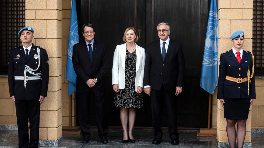 Elizabeth Spehar, U.N. Special Representative of the Secretary-General and Head of UNFICYP Mission poses with Cyprus President Nicos Anastasiades and Turkish Cypriot leader Mustafa Akinci in the buffer zone of Nicosia airport, Cyprus February 26, 2019. Iakovos Hatzistavrou/Pool via REUTERS - RC1B589A8390