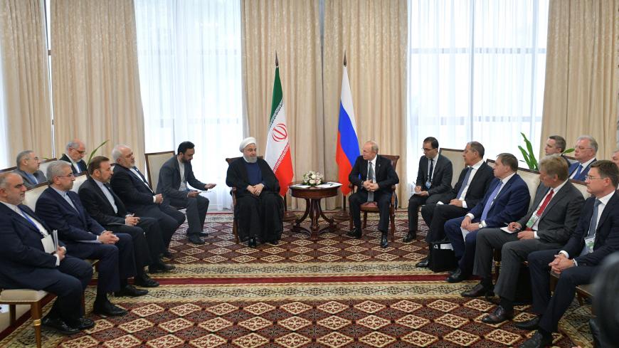 Russia's President Vladimir Putin and Iran's President Hassan Rouhani attend a meeting on the sidelines of the Shanghai Cooperation Organisation (SCO) summit in Bishkek, Kyrgyzstan June 14, 2019. Sputnik/Alexei Druzhinin/Kremlin via REUTERS ATTENTION EDITORS - THIS IMAGE WAS PROVIDED BY A THIRD PARTY. - RC1D5FA36790
