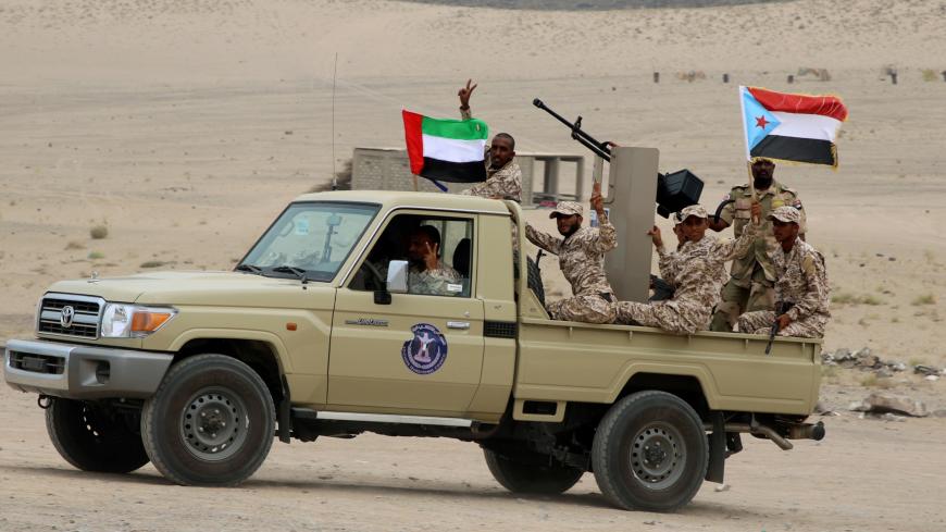 Newly recruited troops of the UAE-backed separatist Southern Transitional Council are seen on a vehicle during their graduation in Aden, Yemen July 23, 2019. REUTERS/Fawaz Salman - RC1A52E65510