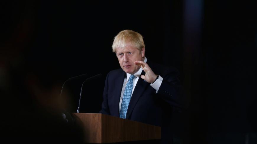 Britain's Prime Minister Boris Johnson gestures during a speech on domestic priorities at the Science and Industry Museum in Manchester, Britain July 27, 2019. Lorne Campbell/Pool via REUTERS - RC1FA8BBE490
