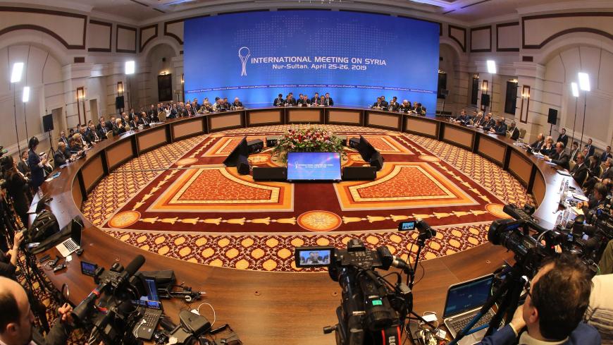 A picture taken on April 26, 2019 shows a general view of the hall where the Syrian constitutional committee takes place in Nur-Sultan, Kazakhstan. - Two-day talks on Syria backed by Iran, Russia and Turkey concluded in Kazakhstan on April 26, 2019 without notable progress on forming a constitutional committee to drive a political settlement in the war-wracked country. (Photo by Alexey FILIPPOV / AFP)        (Photo credit should read ALEXEY FILIPPOV/AFP/Getty Images)