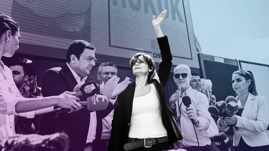 Republican People's Party (CHP) Istanbul chief Canan Kaftancioglu (L) waves to supporters as she stands on a stage to deliver a speech on July 18, 2019 after her trial in Istanbul. - Kaftancioglu faces up to 17 years in prison for allegedly 'insulting the Turkish President' in tweets posted between 2012 and 2017. The trial will resume on September 6, 2019. (Photo by Ozan KOSE / AFP)        (Photo credit should read OZAN KOSE/AFP/Getty Images)