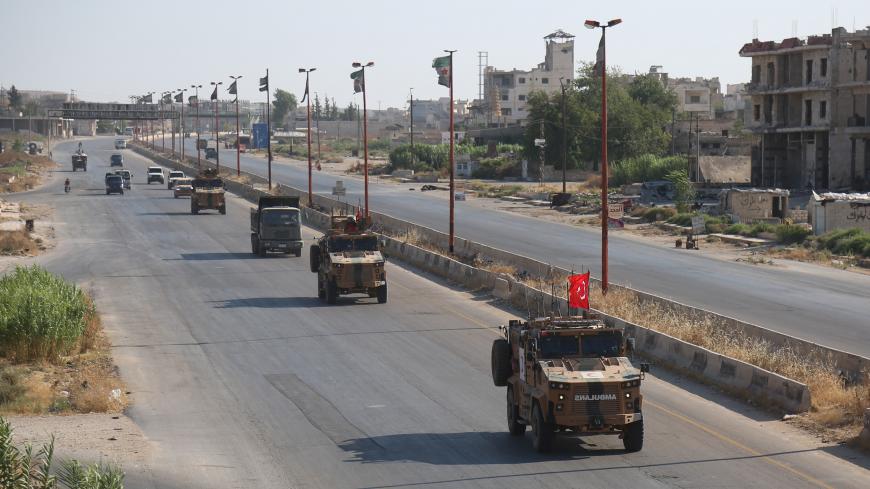 IDLIB, SYRIA - AUGUST 22: Turkish military armoured vehicles are deployed to the observations point in Idlib, de-escalation zone, Syria on August 22, 2019. (Photo by Izeddin Idilbi/Anadolu Agency via Getty Images)
