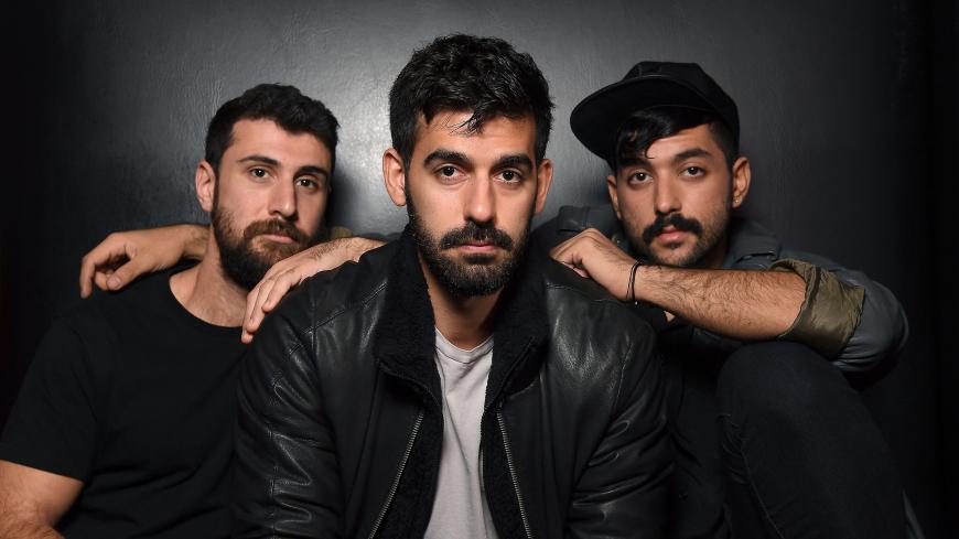 (L-R) Musicians Haig Papazian, Carl Gerges and Hamed Sinno of Mashrou' Leila pose for a picture on November 1, 2017 in New York.
The symbol of solidarity brought a harsh backlash. As Lebanese rockers Mashrou' Leila played in Cairo, fans hoisted in the air rainbow flags, the global emblem of gay equality. The open-air festival on September 22 passed peacefully. But as pictures of the flags spread, Egyptian authorities launched roundups of the gay community, arresting dozens of people, with rights groups sayi