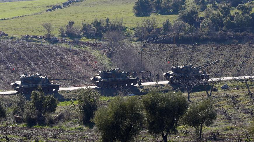 Turkish Army tanks are seen near the Turkish-Syrian border in Kilis province, Turkey January 31, 2018. REUTERS/Osman Orsal - RC1F815A6580