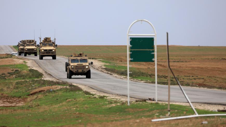 U.S. troops patrol near Turkish border in Hasakah, Syria, November 4, 2018. REUTERS/Rodi Said - RC1F4F72F170