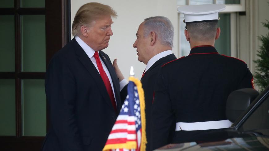 U.S. President Donald Trump sees Israel's Prime Minister Benjamin Netanyahu out as Netanyahu departs the White House from the West Wing in Washington, U.S. March 25, 2019. REUTERS/Leah Millis - RC18951C0D40