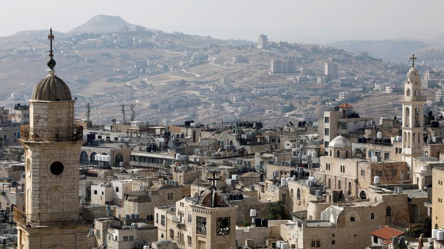 A view shows churches and buildings in Bethlehem, in the Israeli-occupied West Bank June 17, 2019. Picture taken June 17, 2019. REUTERS/Raneen Sawafta - RC1D036833F0