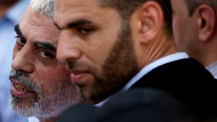 Hamas Gaza Chief Yehya Al-Sinwar looks on as he takes part in a protest against Bahrain's workshop for U.S. Middle East peace plan, in Gaza City, June 26, 2019. REUTERS/Mohammed Salem - RC1569D22400